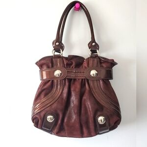 Kathy Van  Zeeland brown shoulder bag.